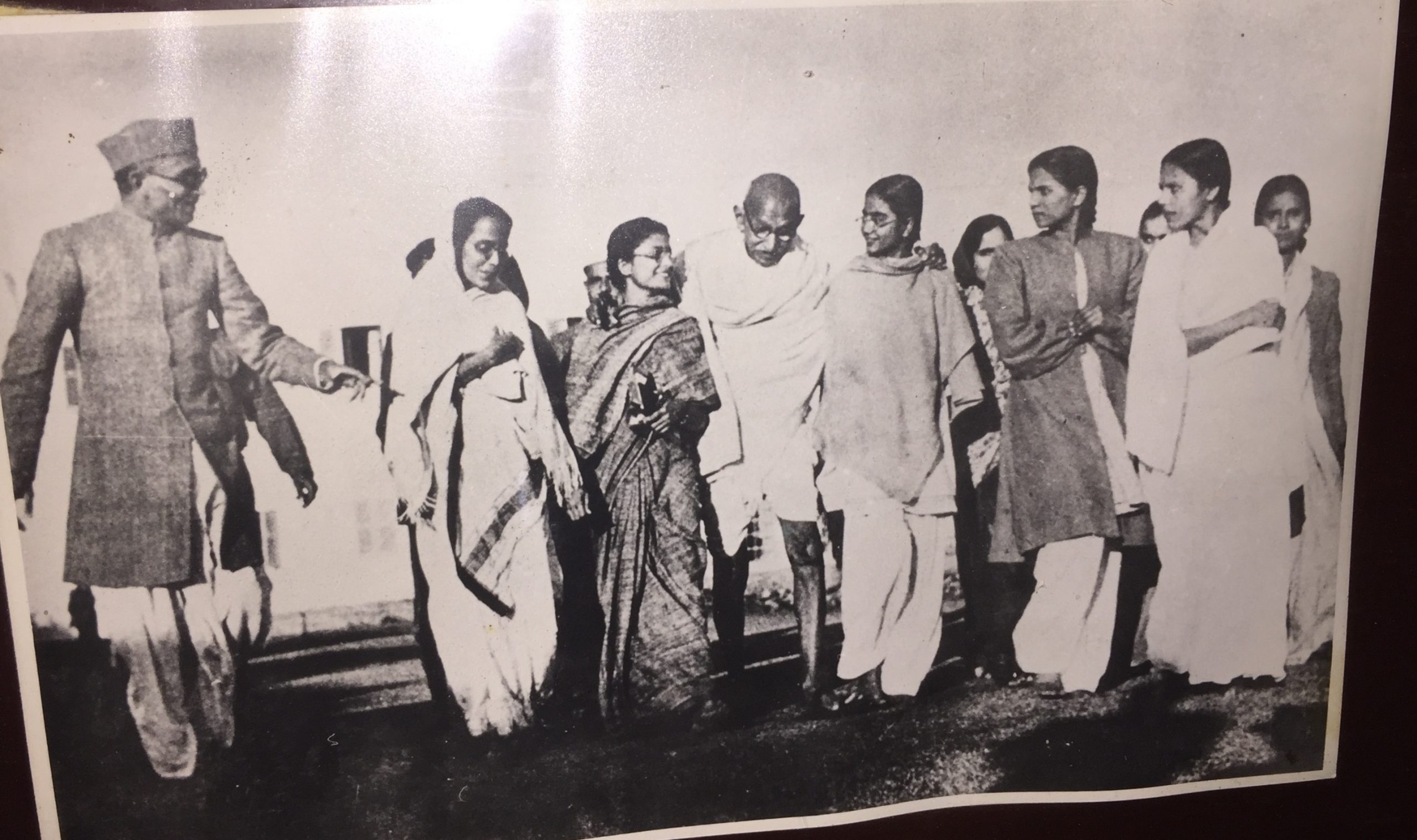 Mahatma Gandhi going with a group of people