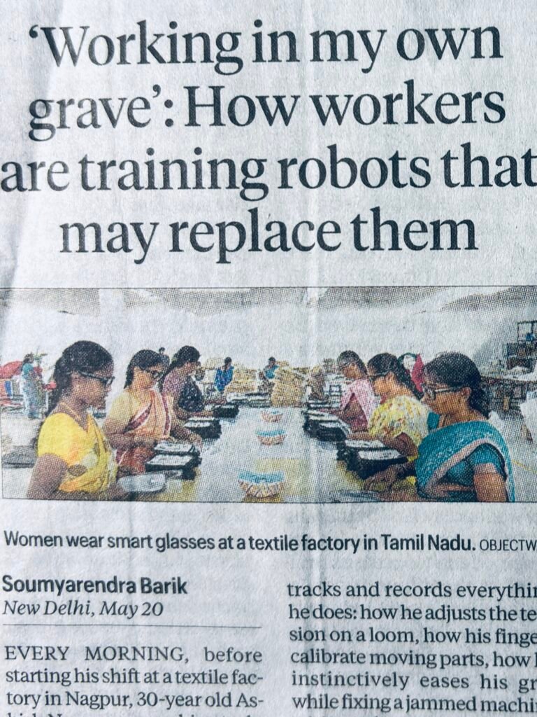 Nagpur Factory women wearing glasses to teach their skills to robots 